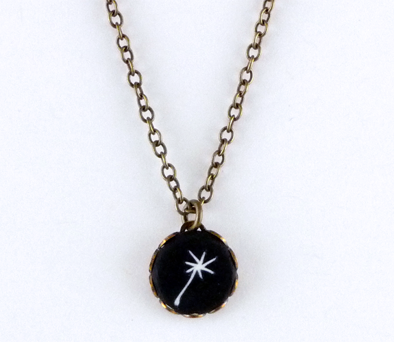  Black Clay & Brass Necklace with Dandelion Seed Design by Yummy & Co.